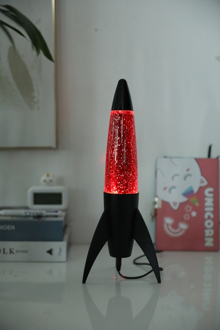 iTotal Rocket Glitter Lampe mit schwarzem Sockel und rotem Licht