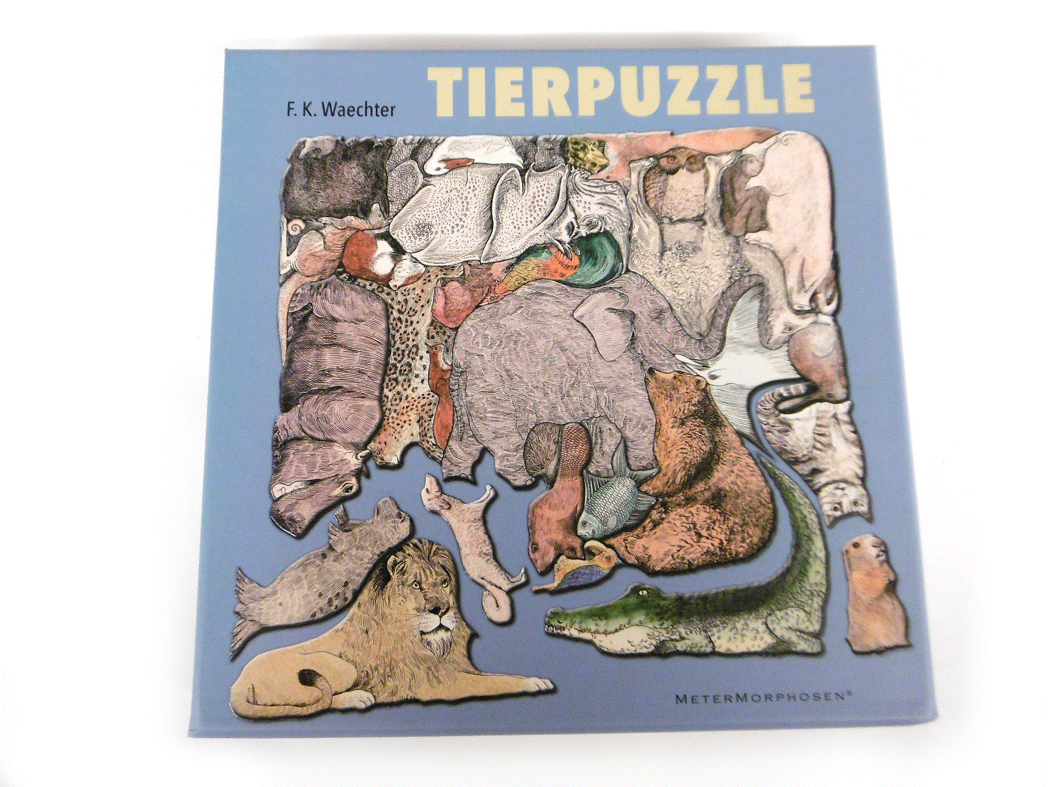 Metermorphosen F. K. Waechters Tierpuzzle Ein Bild aus 33 Tieren 