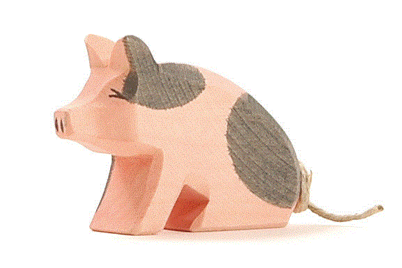 Ostheimer Ferkel gefleckt sitzend